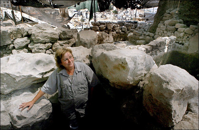 Eilat Mazar, an Israeli archaeologist, stands amid the ruins of a huge public building of the 10th century B.C. that she believes may be the remains of King David's palace in a biblical Jewish capital Jerusalem, August 2005.
