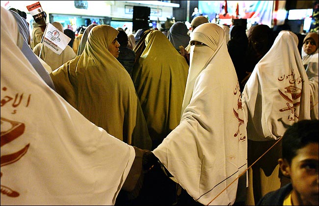 Egyptian women form a security perimeter at a Muslim Brotherhood rally, Zagazig, December 7, 2005.