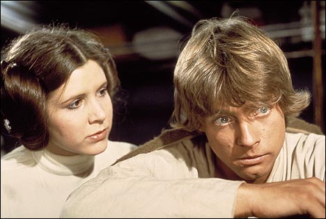 Carrie Fisher as Princess Leia and Mark Hamill as Luke Skywalker in 'Star Wars' (1977).