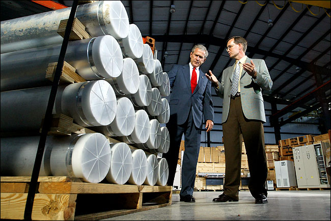 President Bush and Jon Kreykes looked over gas centrifuges for uranium enrichment at the Oak Ridge nuclear installation, Tennessee, July 12, 2004.