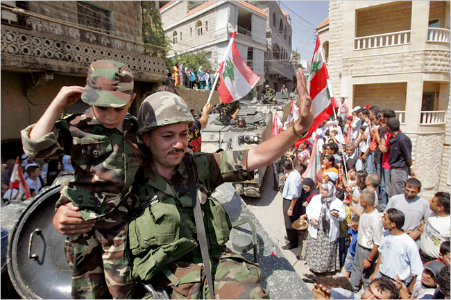 Citizens of Shebaa celebrate the arrival of Lebanese Army soldiers deployed to several towns in southern Lebanon, August 18, 2006.