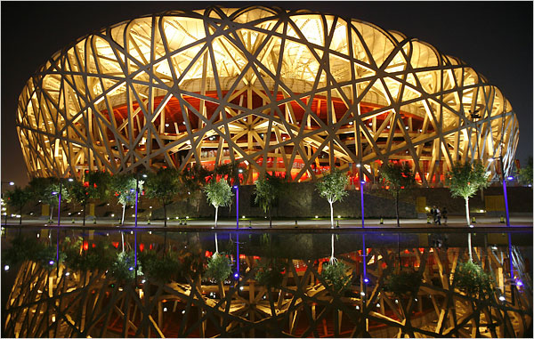 Beijing National Stadium, also known as Bird's Nest, just before it's first use for the opening ceremony of the Olympic Games, August 8, 2008.
Swiss architects Jacques Herzog and Pierre de Meuron used a secondary pattern of irregular crisscrossing beams woven through the main cantilevered trusses that support the roof, to create the illusion of a gigantic web of rubber bands straining to hold the building in place.