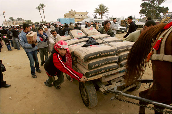 Bags of cement, that Israel suspects Hamas of using cement to build tunnels, are in particular demand, this new Palestinian invasion of Egypt, January 23, 2008.