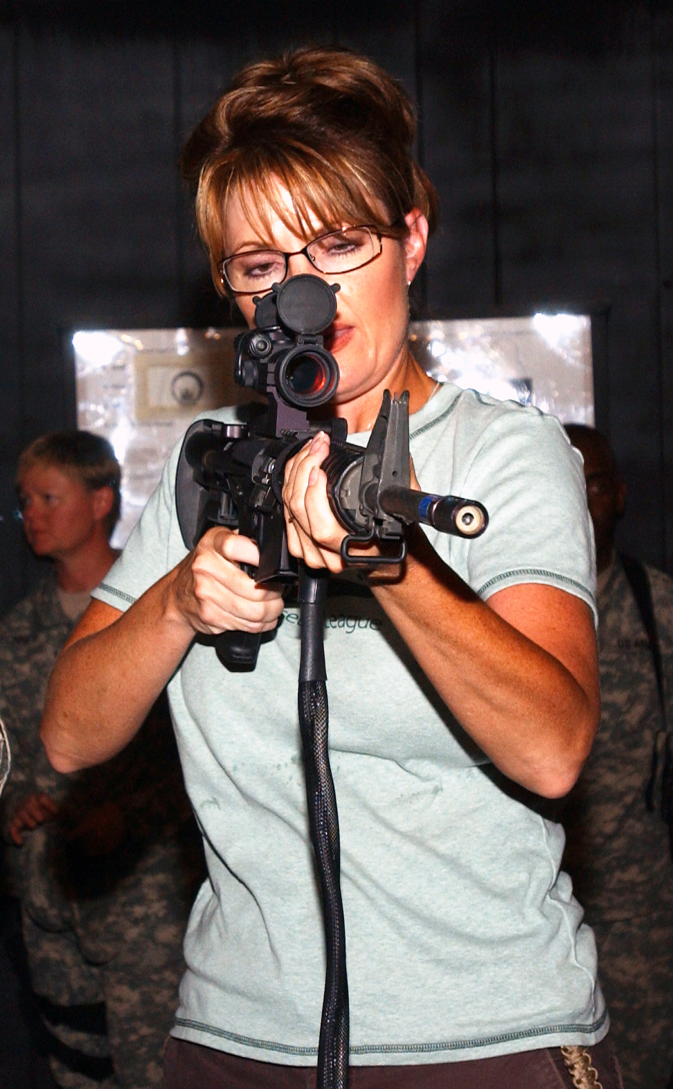 Governor Sarah Palin of Alaska tests out the Engagement Skills Trainer while her visit to the Soldiers of 3rd Battalion, 297th Infantry Regiment, Alaska National Guard to learn about their mission in Kuwait, Camp Buehring, Kuwait, July 24, 2007.