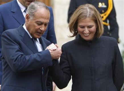 Israeli Foreign Minister Tzipi Livni smiles dauring a talk with her Egyptian counterpart Ahmed Abul-Gheit, following a news conference, the Presidential palace, Cairo, Egypt, December 25, 2008.