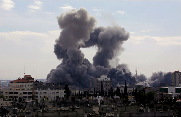 Smoke billowing from the bombs seen from Rafah as hundreds of Palestinians are also killed and scores more wounded in the first hour of Israel’s massive attack on about 100 Hamas sites throughout Gaza in retaliation for the recent rocket fire from the area, Gaza, December 27, 2008.