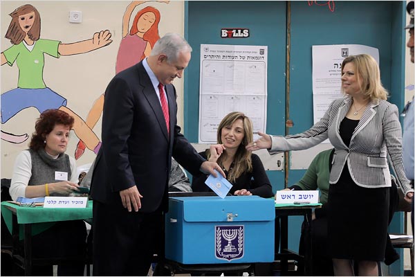 Benjamin Netanyahu, the leader of the Likud Party, casting his vote with his wife, Sarah, at a polling station in Jerusalem, February 11, 2009.
