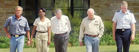 President George W. Bush, Condoleezza Rice, Defense Secretary Donald H. Rumsfeld, Vice President Dick Cheney and Gen. Richard B. Meyers, walked to a news conference, Bush Texas ranch, Day 100 of official end of War against Iraq, August 9, 2003.