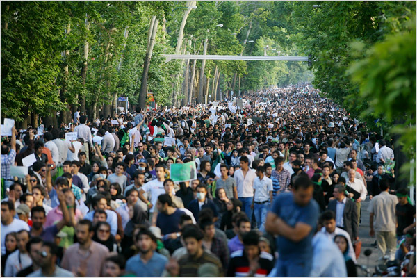 The broad river of people -- young and old, dressed in traditional Islamic gowns and the latest Western fashions -- march slowly through Tehran, June 16, 2009.