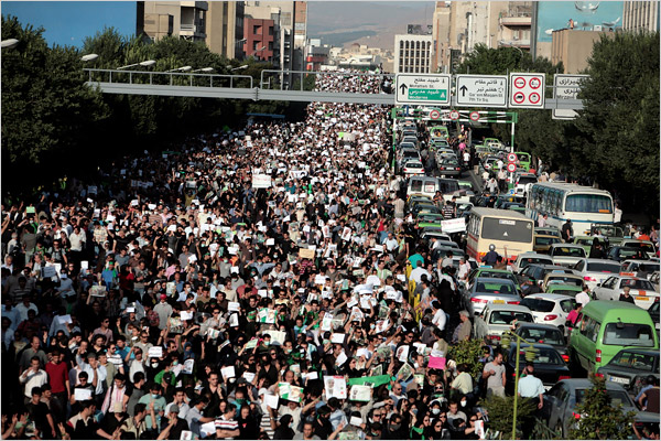 In a described as calm and orderly protest, demonstrators walk in silence from Hafte-Tir Circle to toward the University of Tehran, June 17, 2009.