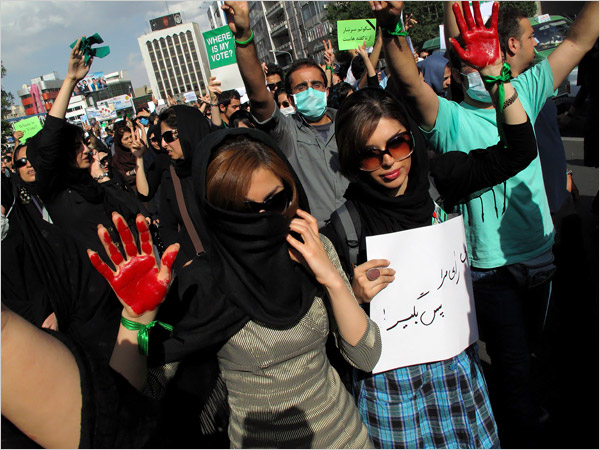 Young people mainly dressed in the latest Western fashions demonstrate against the Islamic regime, Tehran, June 17, 2009.