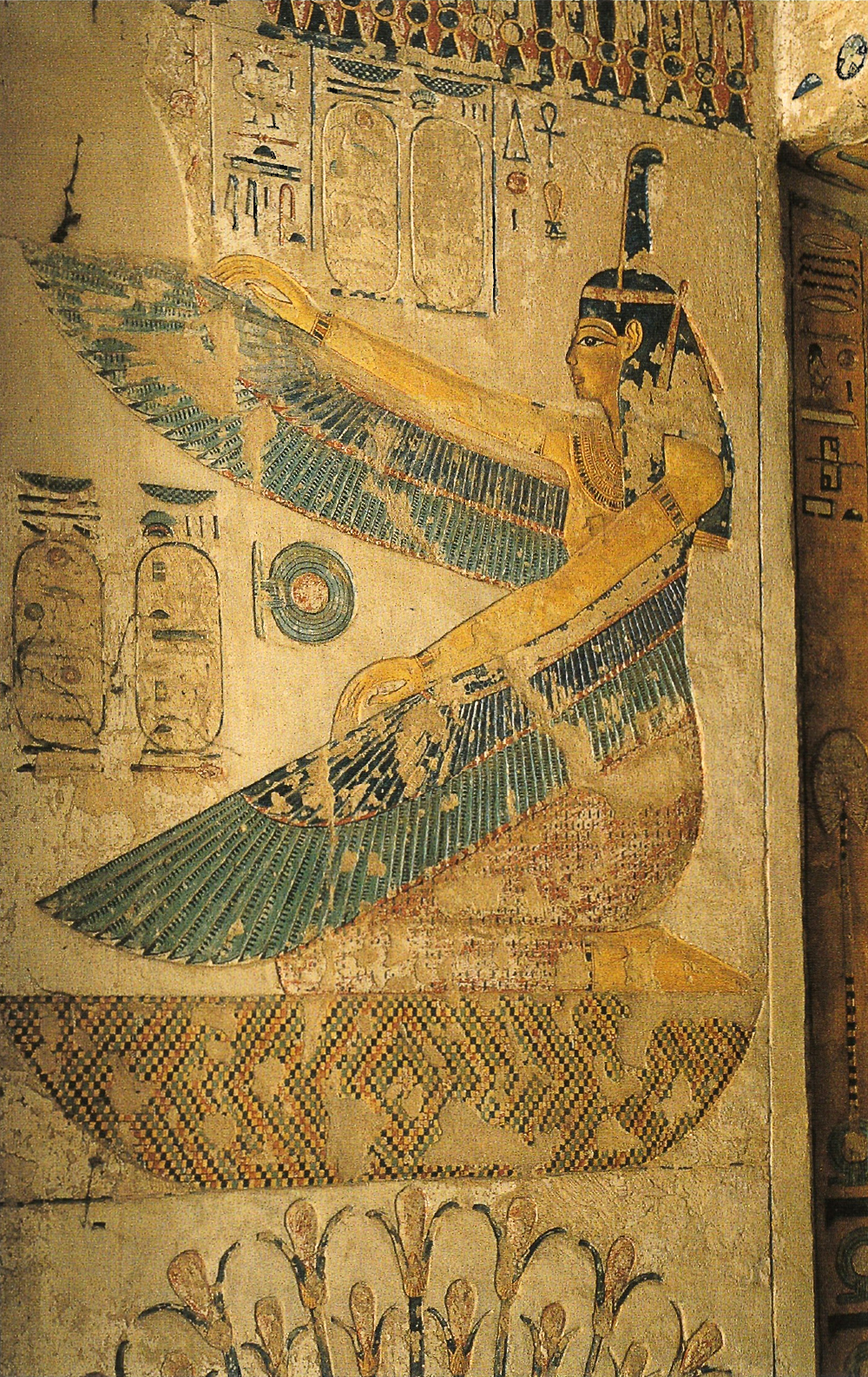 Maat, goddess of truth and personification of the concept maat, wearing on her head the feather of truth and opens wings to embrace and protect a hieroglyphic sign which could signify 'mourn', as utilized at the entrance to a number of later New Kingdom royal tombs, 19th dynasty, Tomb of Siptah, Valley of the Kings, Western Thebes, Luxor, Egypt.