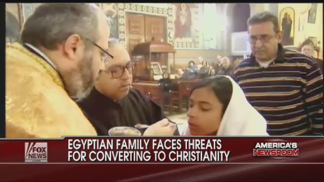 Egyptian converts from Islam to Christianity, Maher Al- Gawhary and daughter Dina, who struggle for their civil rights, perform Communion in a Cairo church as appeared on Fox News Channel, January 28, 2010.