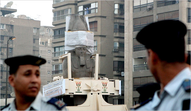 Engineers moves the 3,200-year-old statue of Pharaoh Ramesses II from a congested square in downtown Cairo to its new home at the under-construction Grand Museum near Giza Pyramids, August 25, 2006.
