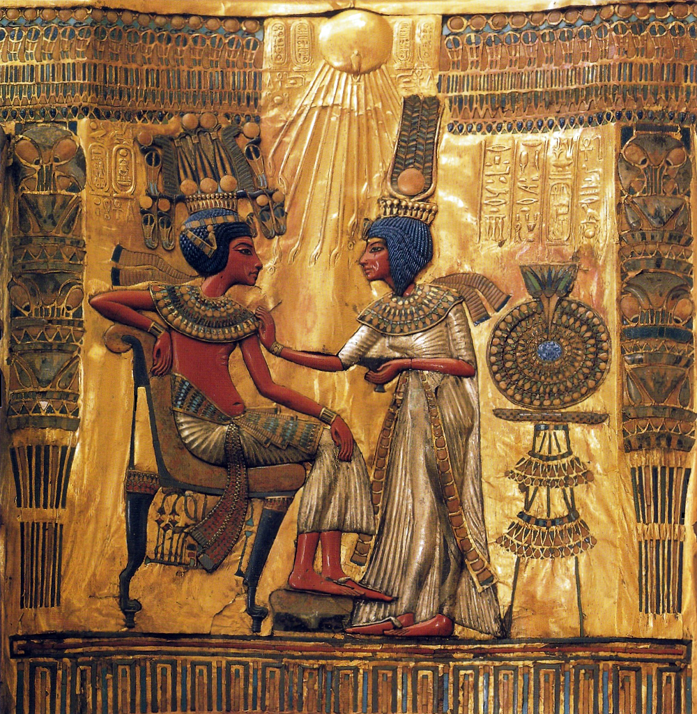 The back of the 'Golden Throne', shows the king Tutankhamun and his wife Ankhesenamun in a floral pavilion receiving the life-giving illuminative rays of the Aten, wood overlaid with precious metals and decorated with rich inlays.