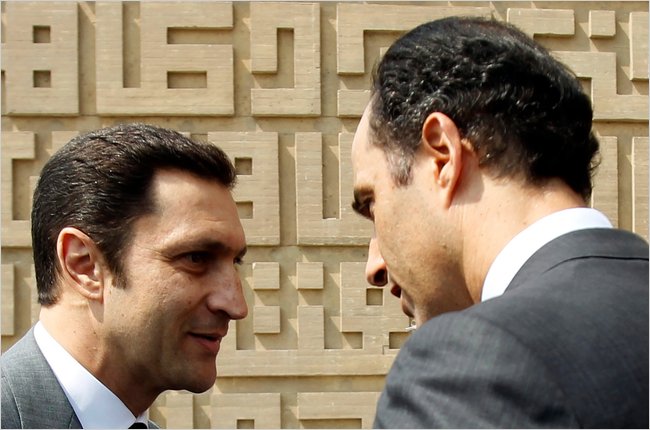 Alaa Mubarak, left, and Gamal Mubarak, the sons of Egyptian President Hosni Mubarak, October 2010.