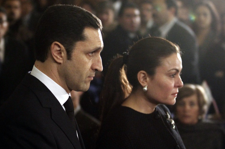 Alaa Mubarak and his wife Heddy Rasekh attend the Coptic Christmas eve mass, led by Pope Shenouda III, the 117th Pope of the Coptic Orthodox Church of Alexandria and Patriarch of the See of St. Mark, Greater St. Mark Cathedral, Cairo, January 6, 2011.