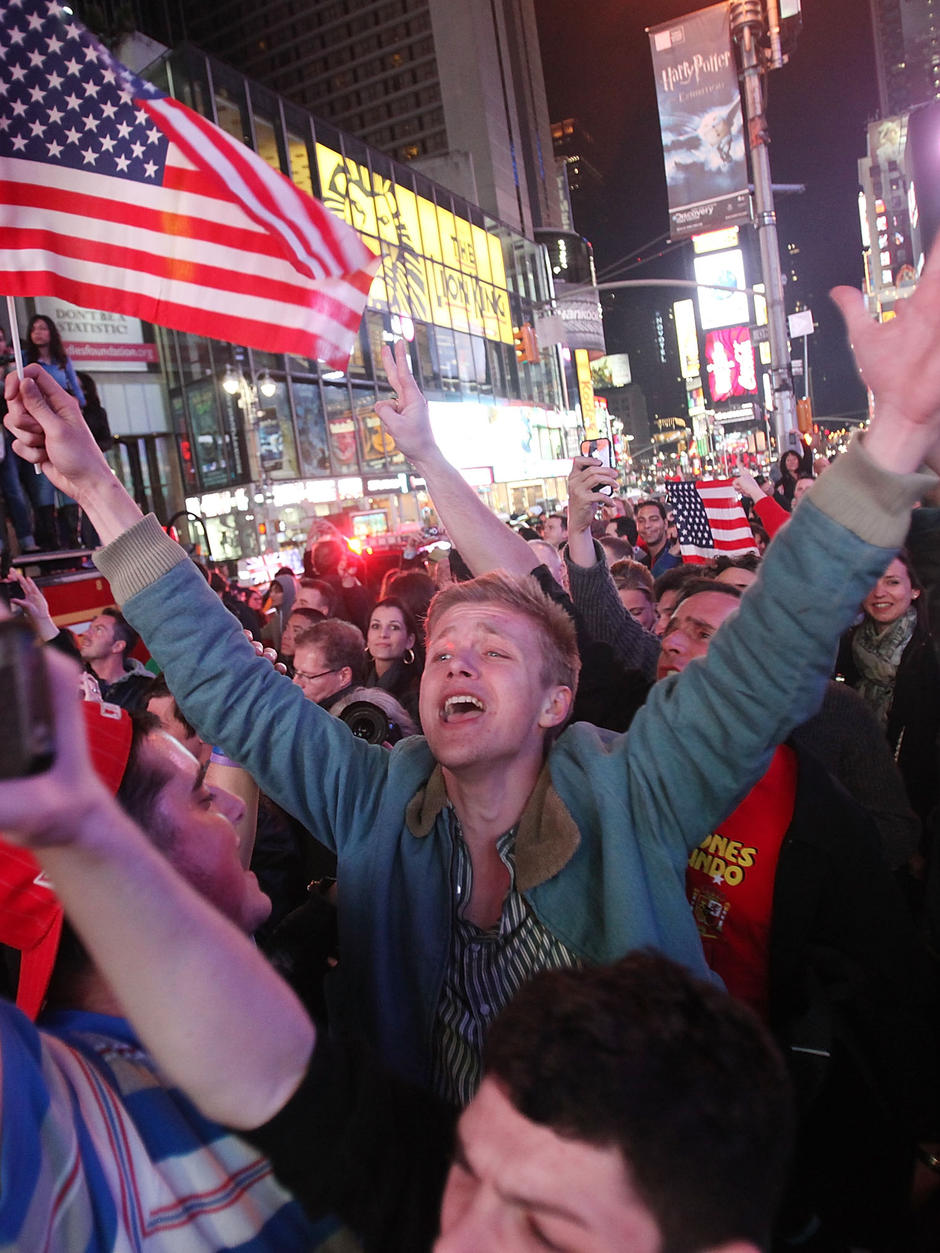 Thousands of jubilant Americans storm in to Times Square to celebrate bin Laden's death, New York, late night May 1, 2011.