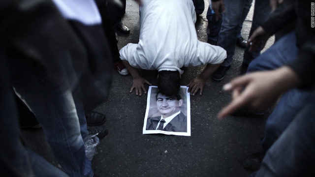 A highly circulated Internet image depicting an Egyptian man worshipping President Mubarak as God, Cairo, Egypt, February 2, 2011.