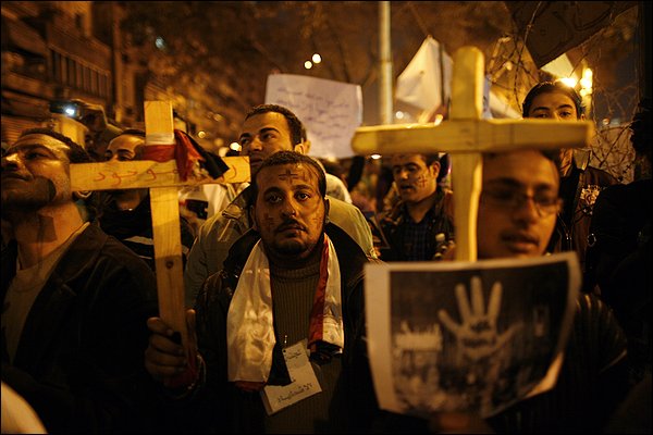 Egyptian Coptic Christians demonstrate calling for state guard of Christians' rights, outside the state Radio and Television Union building, downtown Cairo, Egypt, March 8, 2011.
