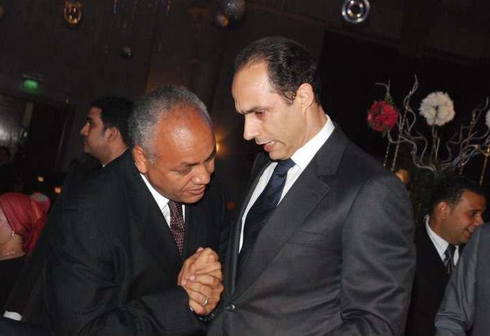 Mustapha Bakry bows as listening to Gamal Mubarak, c. 2010.