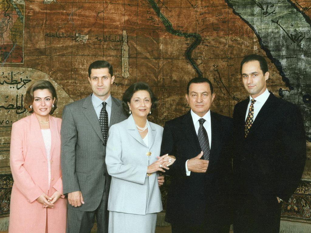 Egypt's President Hosni Mubarak, his wife, Suzanne, and their two sons, Gamal, right, and Alaa, along with Alaa's wife, Heidi a-Rasekh, the presidential palace, Cairo, c. 2003.