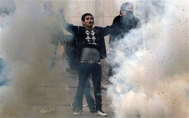Police use teargas during clashes with the wave of student protest that stormed Tunisia and forced President Zein al-Abedeen bin Ali to flee into exile, Tunis, Tunisia, January 14, 2011.