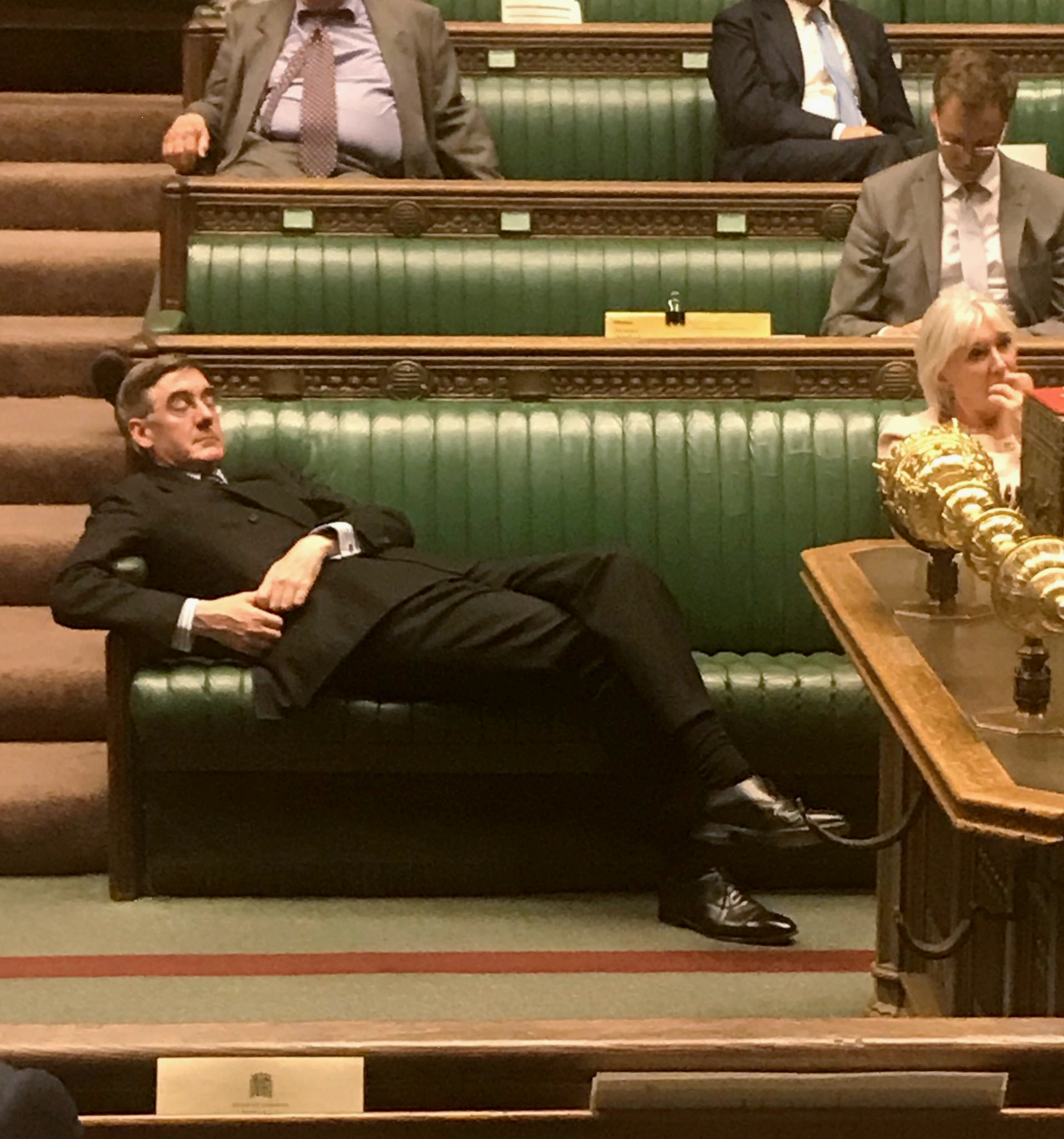 The Leader of the House of Commons Jacob Rees-Mogg lounging languidly along the front bench during a historic Brexit debate was criticized as physical embodiment of arrogance, entitlement, disrespect and contempt for the parliament, London, September 3, 2019.