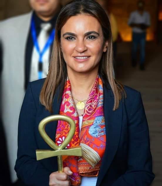 Sahar Nasr, the Egyptian Minister of Investment and International Cooperation, holds Ankh the Key of Life during a national celebration, 2019.